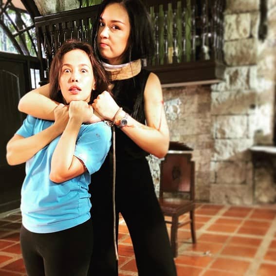 Behind-The-Scenes Ana Abad Santos aka Eva do between takes