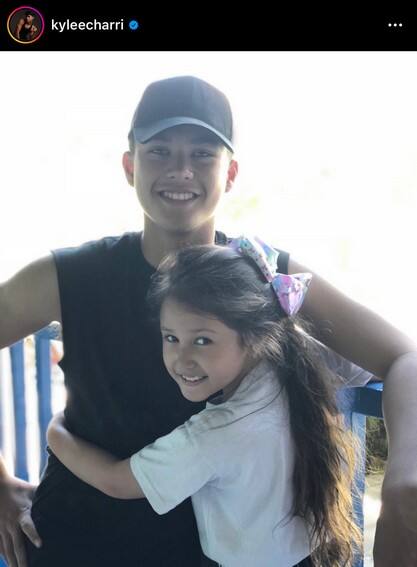 Kyle Echarri with his little sister